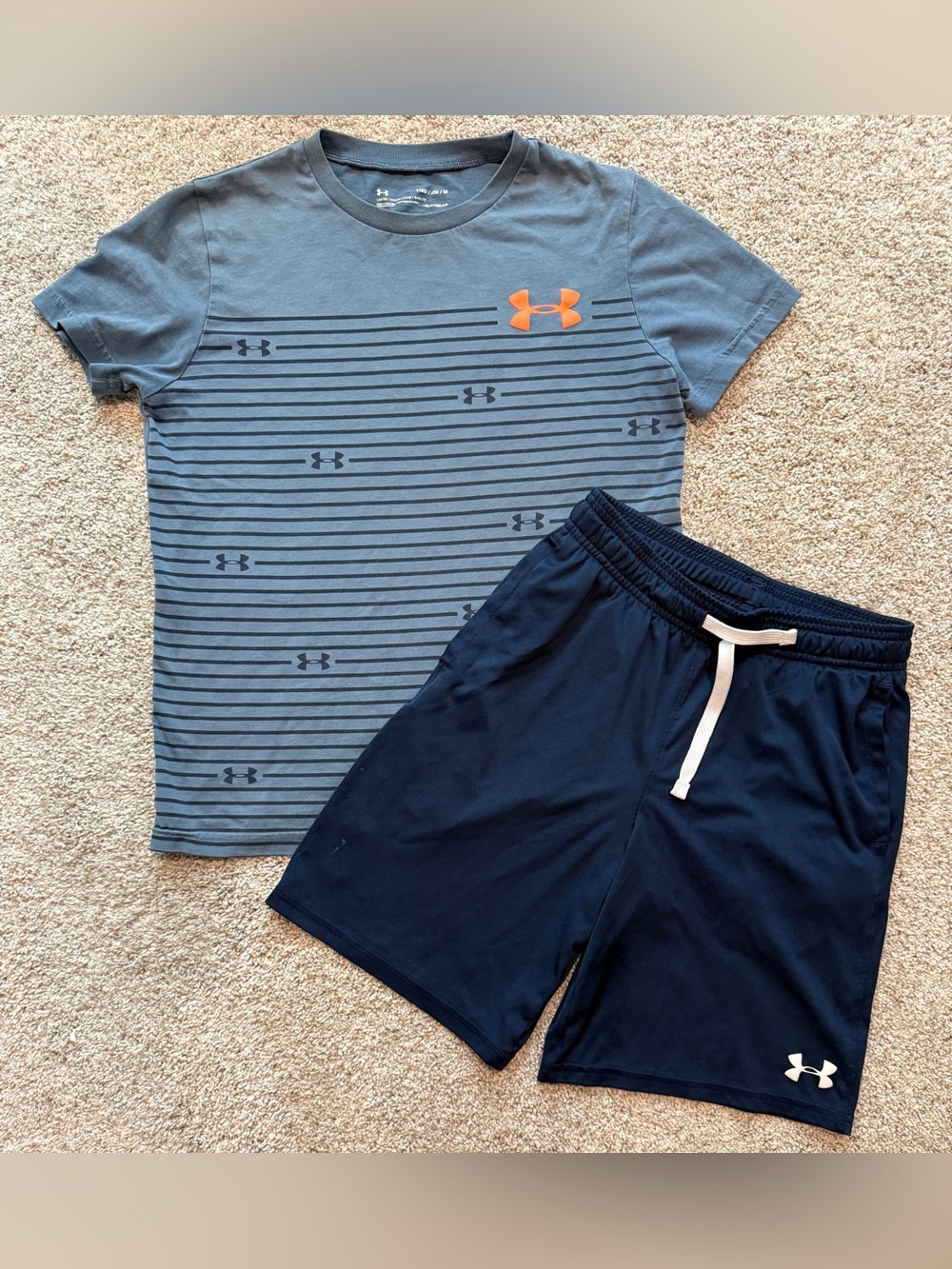 Under Armour youth medium shorts & shirt.  See pics for flaws.